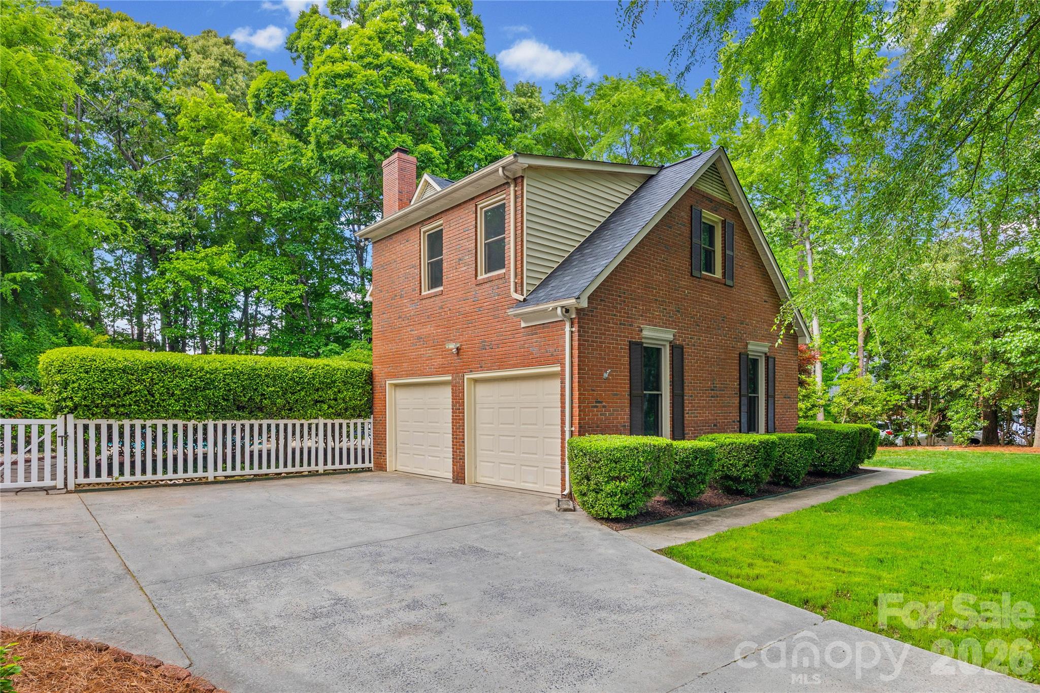 1596 Old Tara Lane Fort Mill, SC 29708 - Photo 45 of 47 a view of a house with a yard and large trees