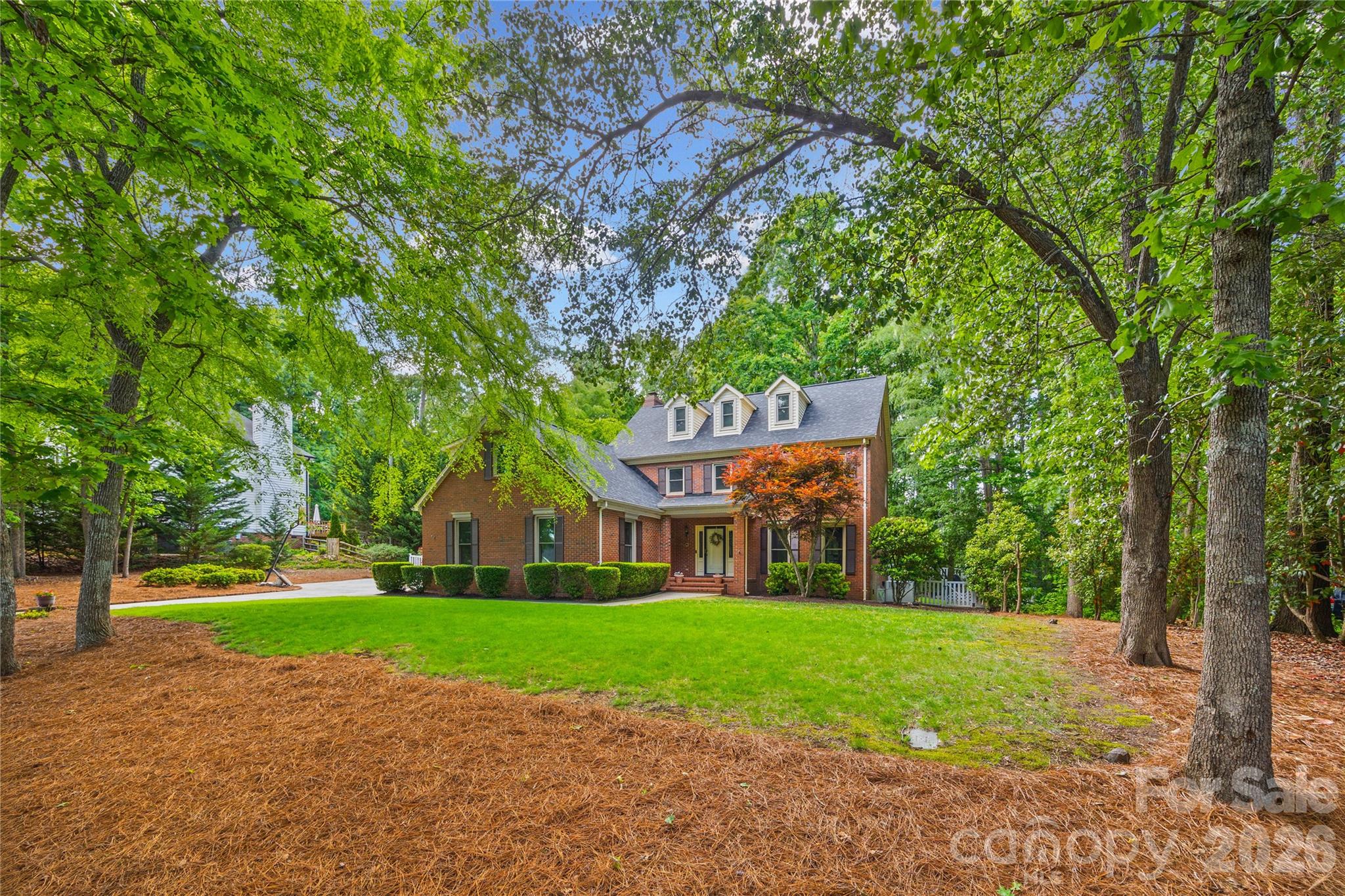 1596 Old Tara Lane Fort Mill, SC 29708 - Photo 46 of 47 a view of a house with a big yard and large trees