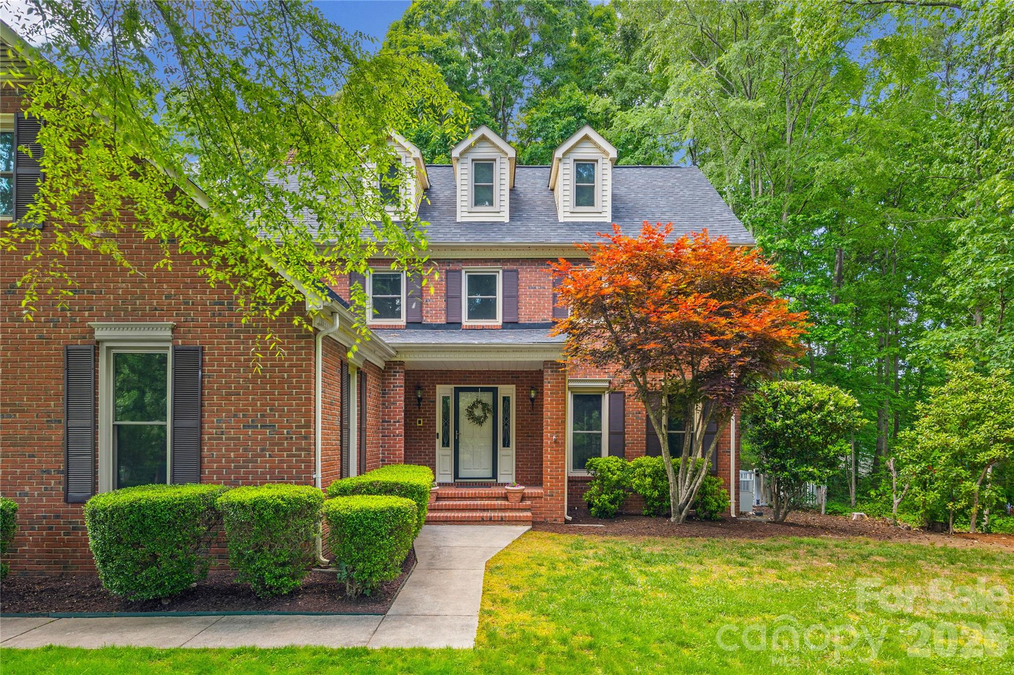 1596 Old Tara Lane Fort Mill, SC 29708 - Photo 5 of 47 a front view of a house with garden