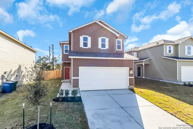 a front view of house with yard