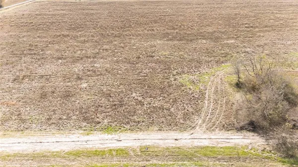 a view of water heater with a yard