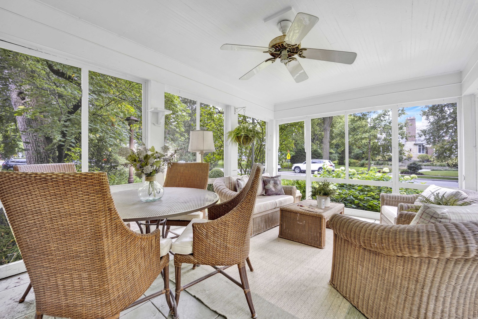 106 Michaux Road Riverside, IL 60546 - Photo 17 of 40 a dining room with furniture a flat screen tv and a fountain