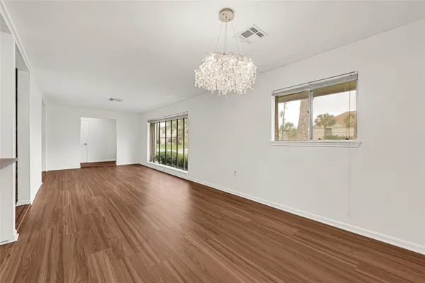 a white bath tub and a shower