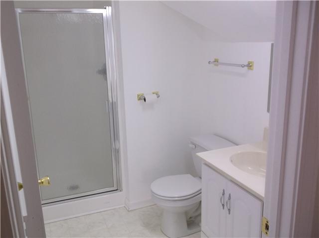 6386 Morton Road Greenbrier, TN 37073 - Photo 12 of 15 a white toilet sitting next to a bathroom sink