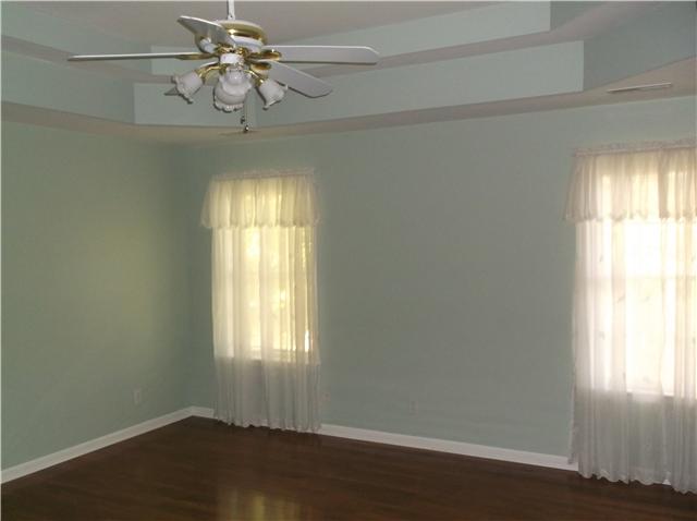 6386 Morton Road Greenbrier, TN 37073 - Photo 13 of 15 a view of empty room with wooden floor and fan