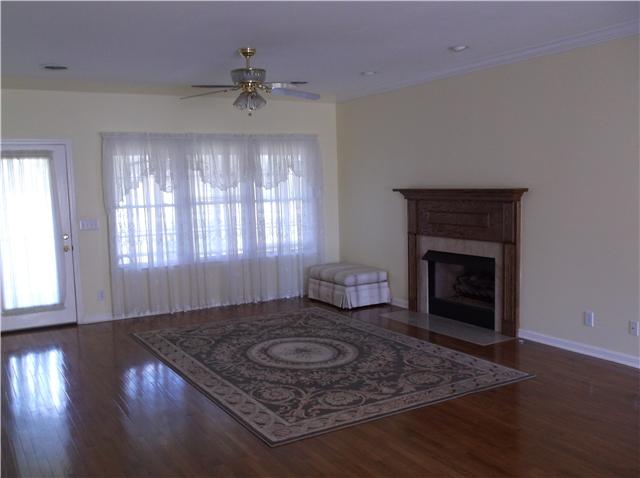6386 Morton Road Greenbrier, TN 37073 - Photo 6 of 15 a living room with furniture and a fireplace