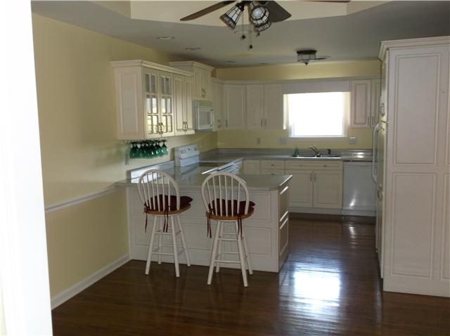 6386 Morton Road Greenbrier, TN 37073 - Photo 8 of 15 a view of a room with wooden floor windows and wooden floor