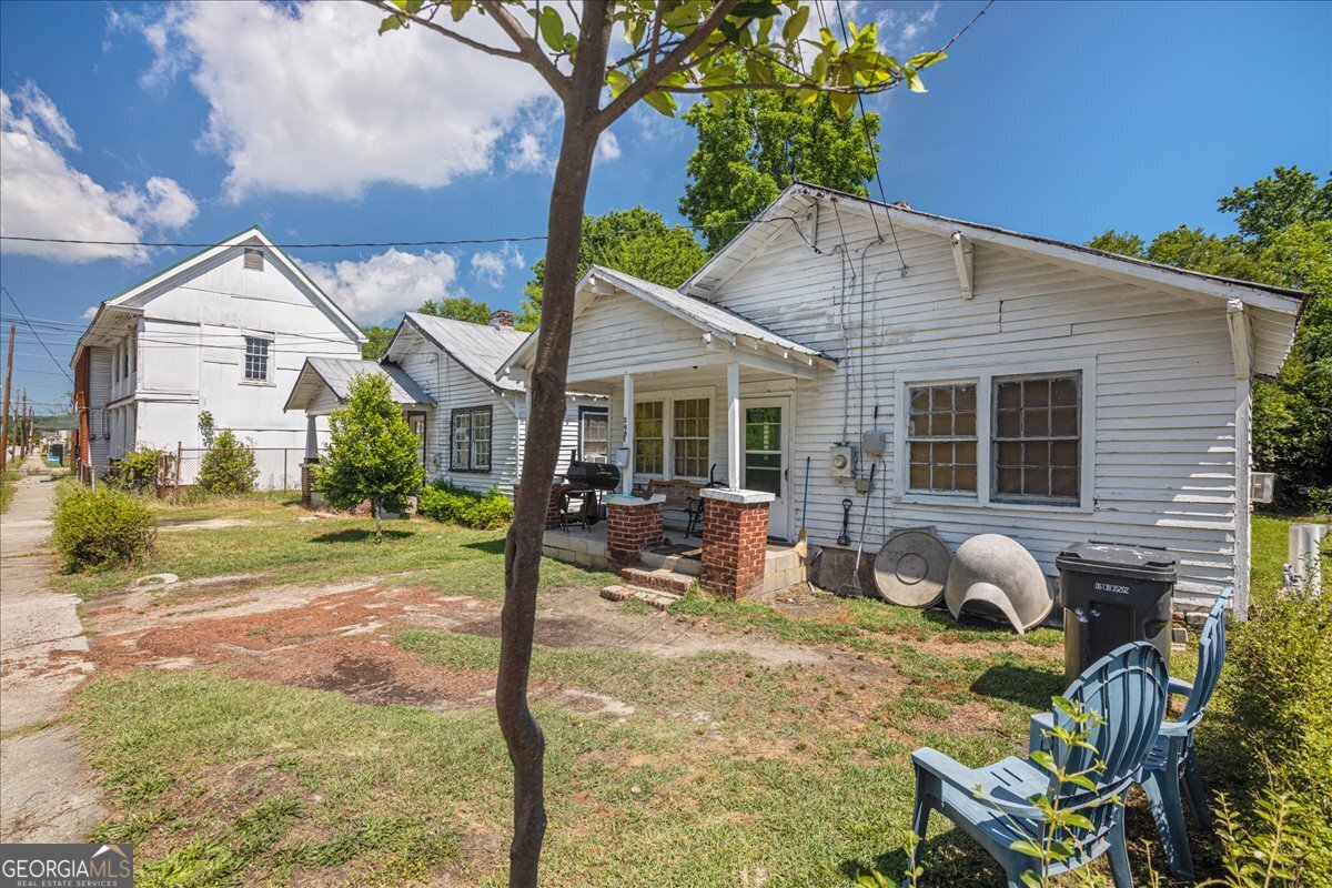 1377 Wrightsboro Road Augusta, GA 30901 - Photo 29 of 49 a house view with a sitting space