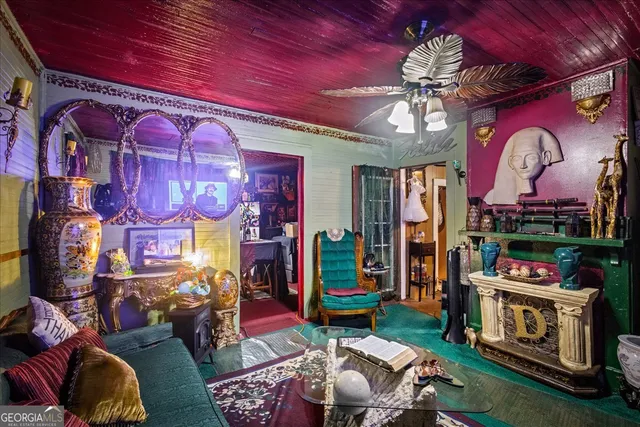 a view of a chairs and table in a room