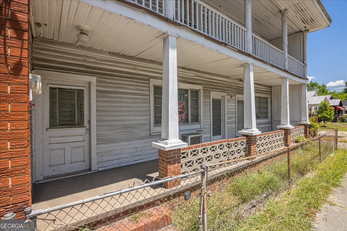 1377 Wrightsboro Road Augusta, GA 30901 - Photo 4 of 49 a view of house with patio