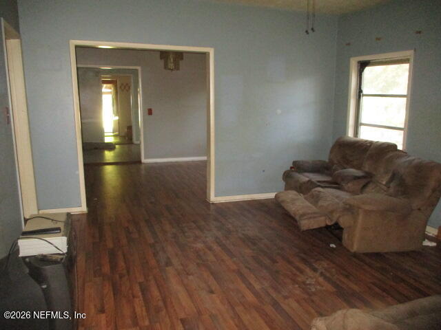 9742 Highway 301 Hampton, FL 32044 - Photo 16 of 19 a living room with furniture and wooden floor