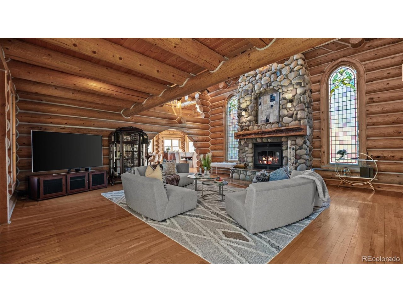 3875 F F 3/4 Road Palisade, CO 81526 - Photo 14 of 45 a living room with furniture and a fireplace