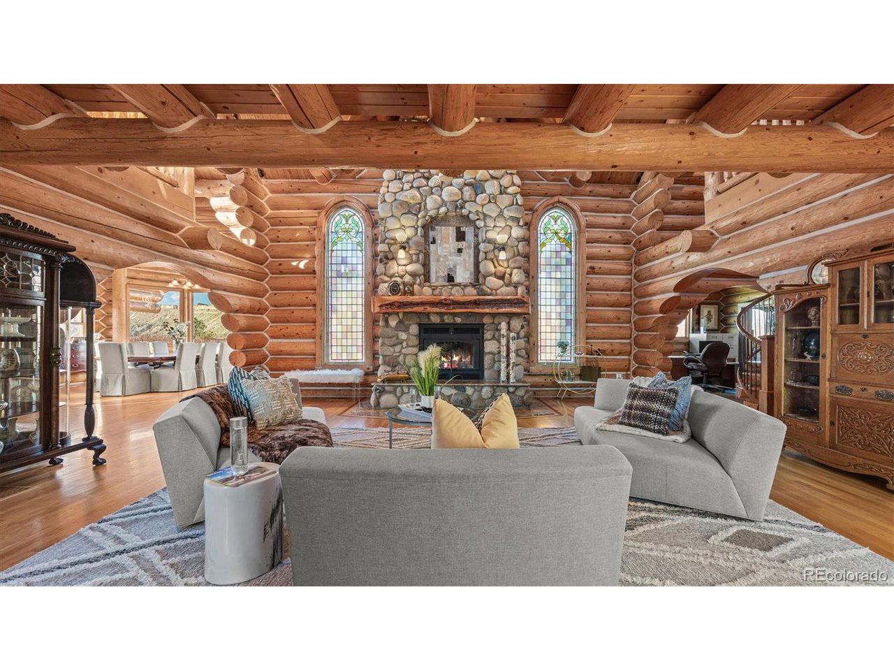 3875 F F 3/4 Road Palisade, CO 81526 - Photo 15 of 45 a living room with furniture a fireplace and a flat screen tv