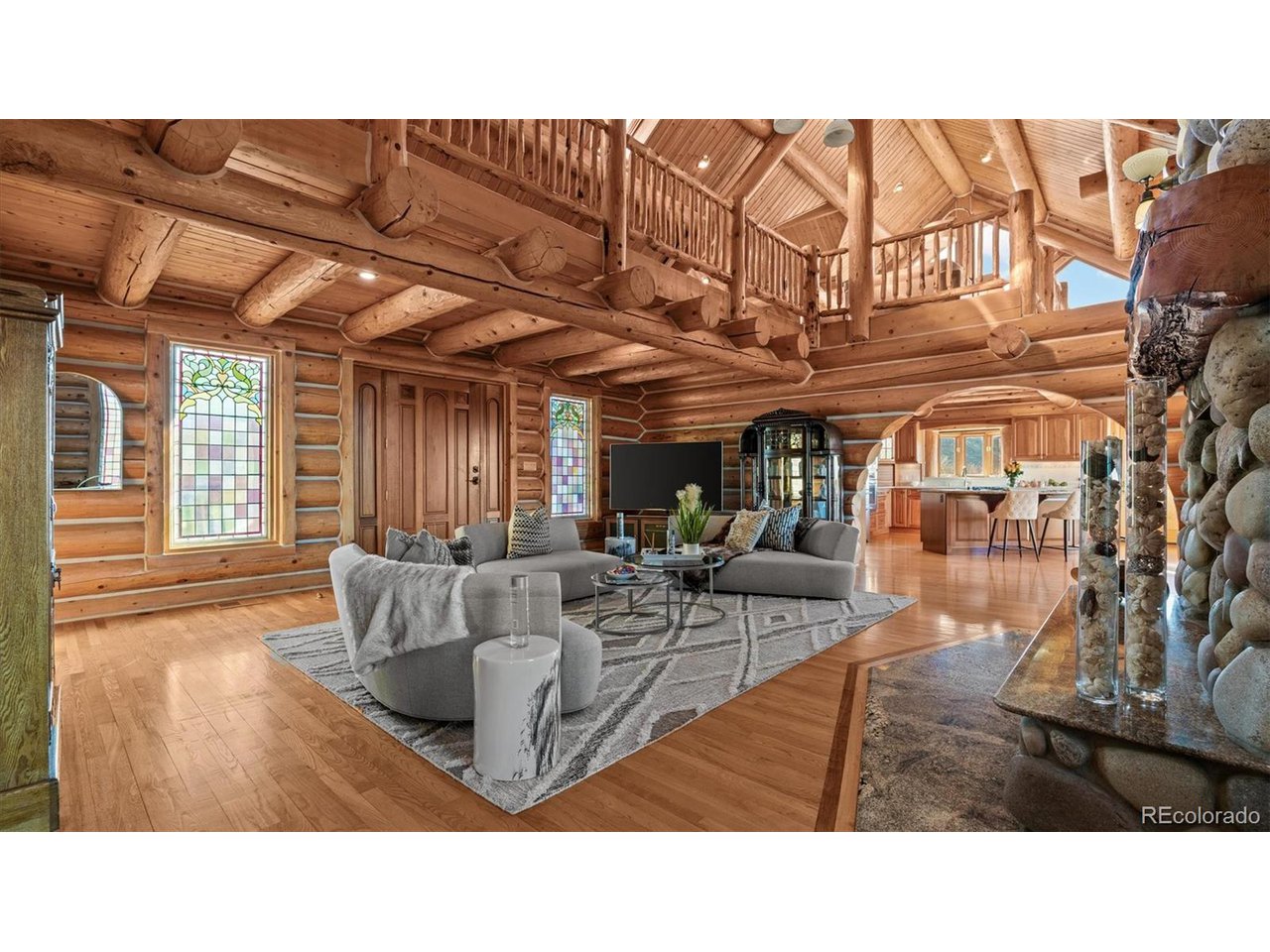 3875 F F 3/4 Road Palisade, CO 81526 - Photo 16 of 45 a living room with furniture and a large window