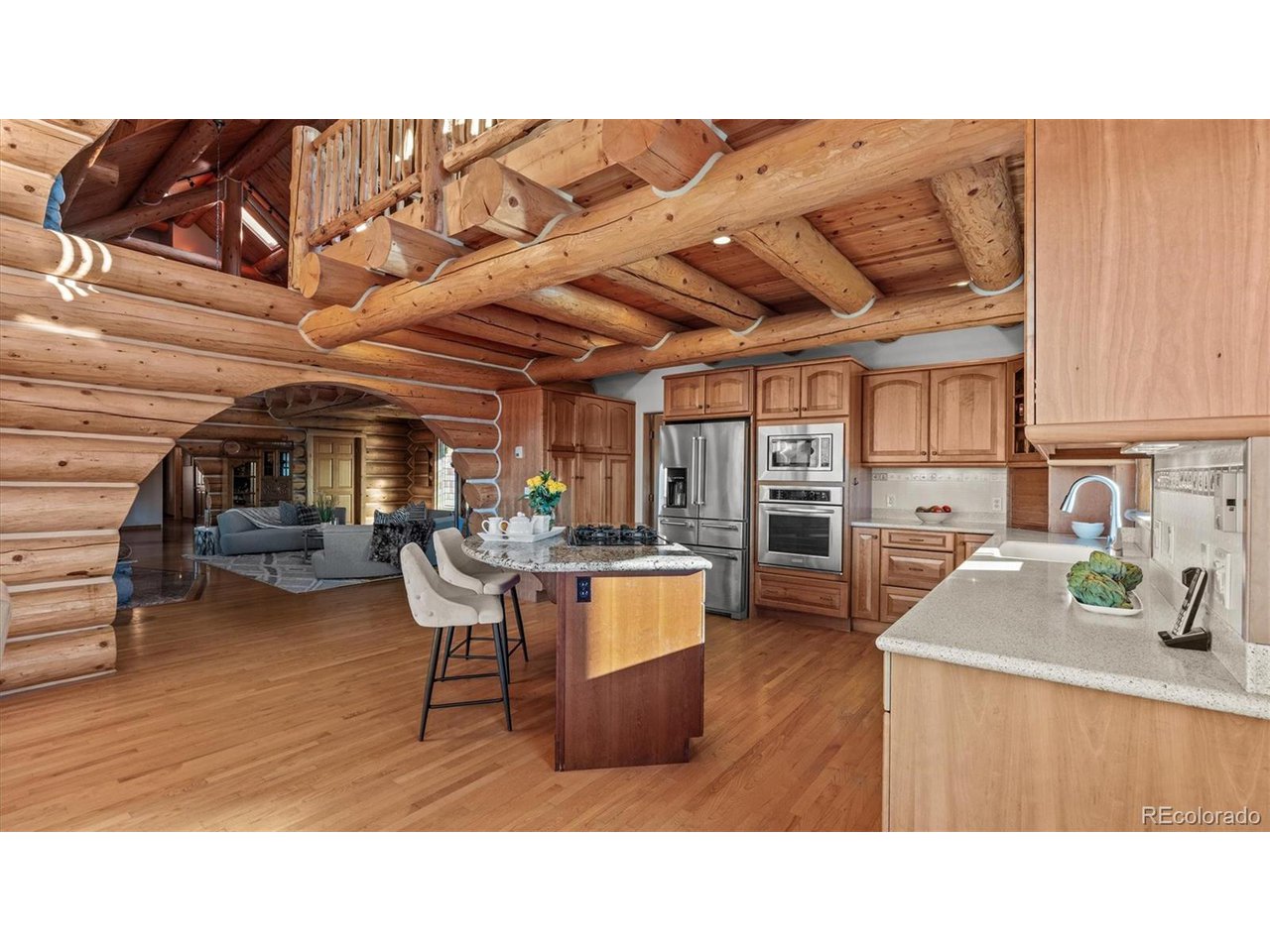 3875 F F 3/4 Road Palisade, CO 81526 - Photo 19 of 45 a kitchen with stainless steel appliances kitchen island granite countertop a sink and cabinets