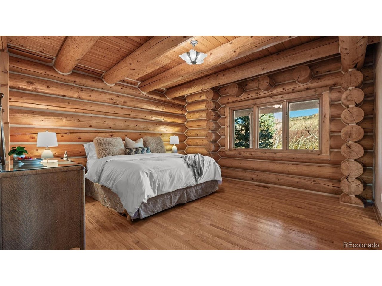 3875 F F 3/4 Road Palisade, CO 81526 - Photo 34 of 45 a black and white bed in a room next to a window
