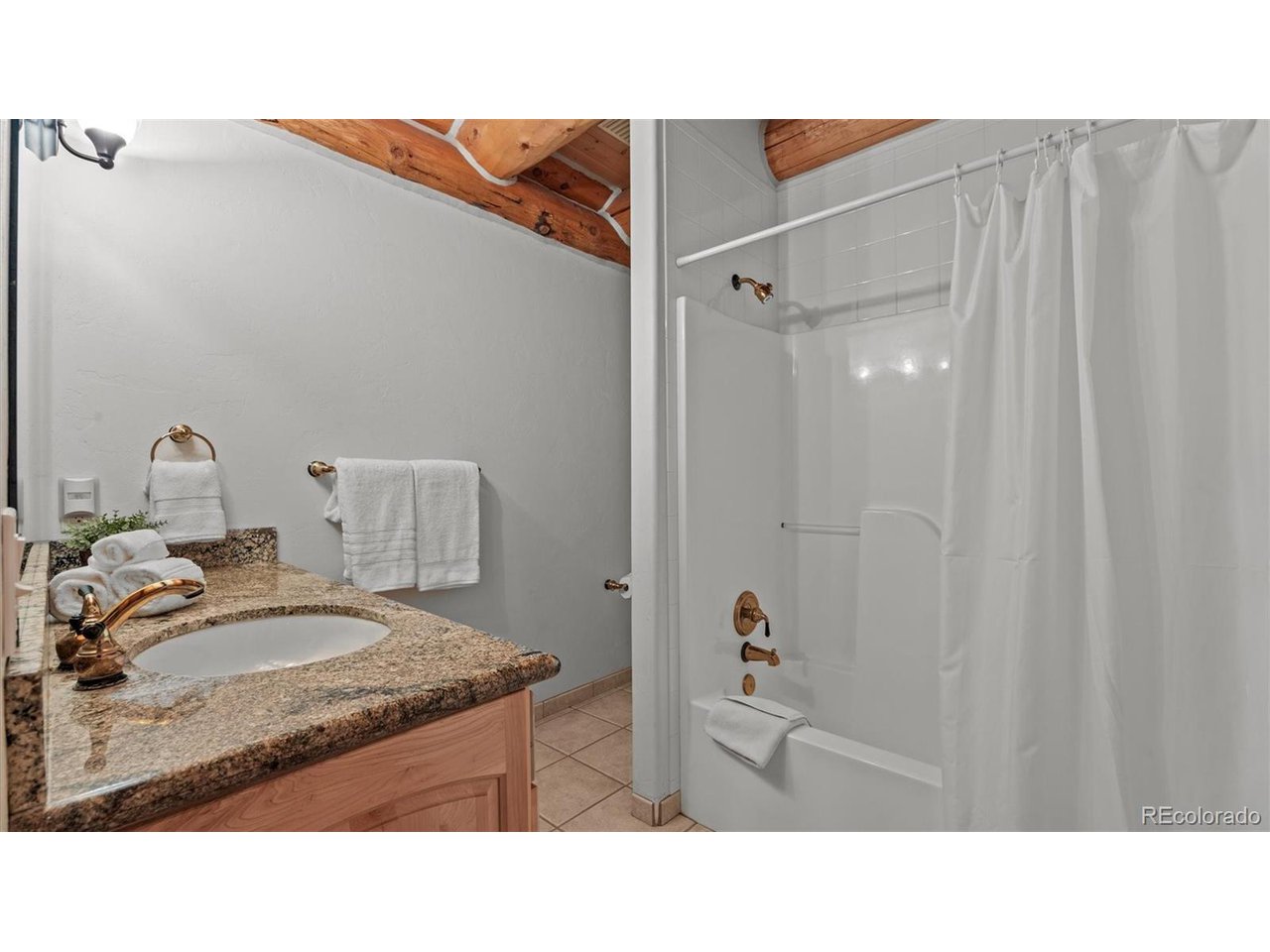 3875 F F 3/4 Road Palisade, CO 81526 - Photo 39 of 45 a bathroom with a sink and a mirror