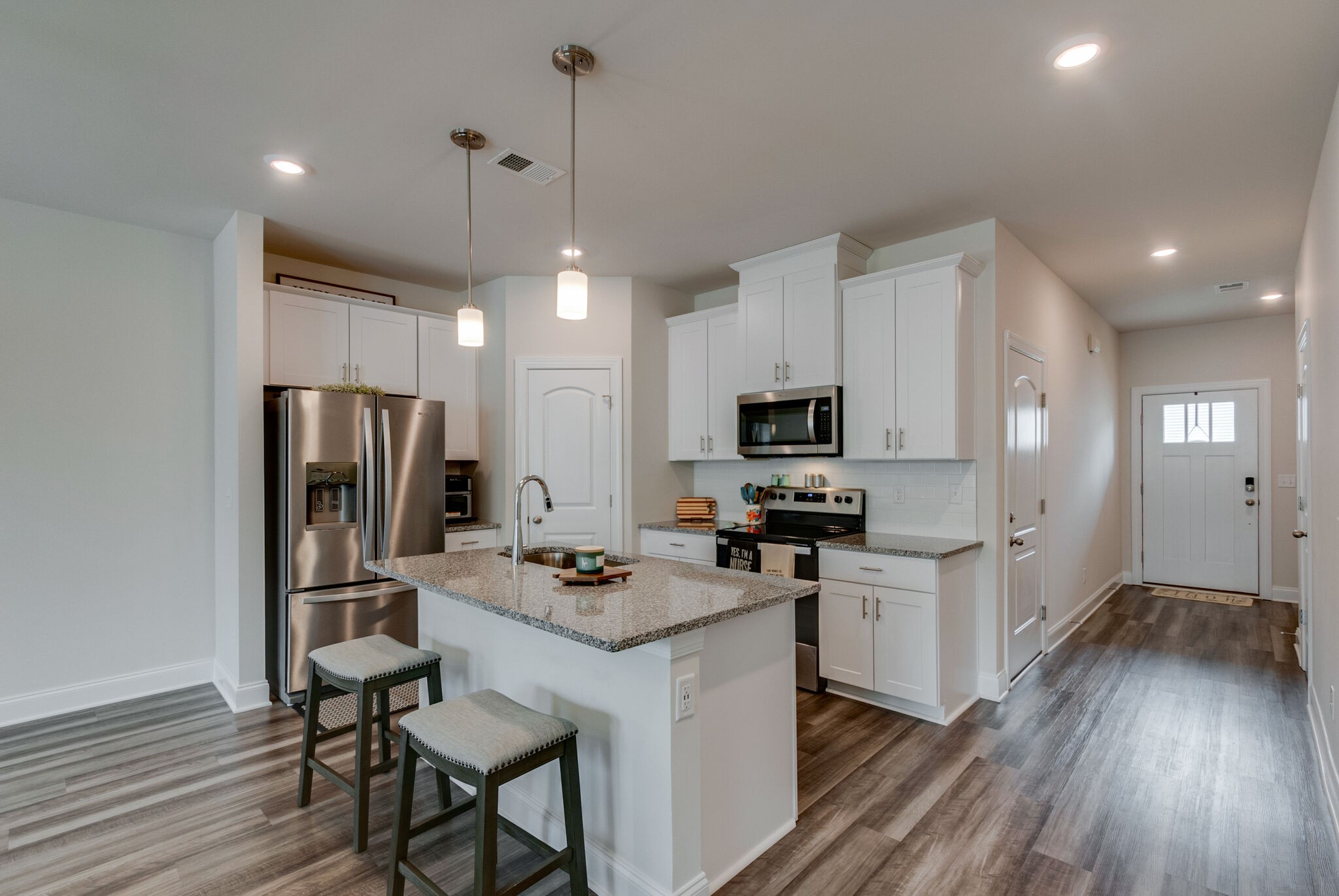926 Oak Ridge Lane Columbia, TN 38401 - Photo 8 of 27 a kitchen with stainless steel appliances a refrigerator stove a sink and a oven