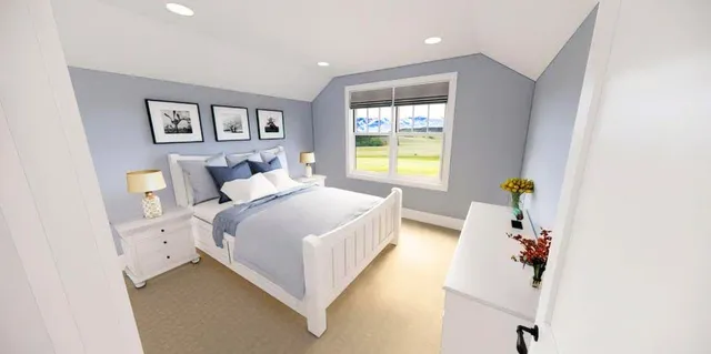 a bed room with a bed and a window