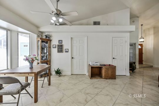 1260 Arroyo Street Ridgecrest, CA 93555 - Photo 9 of 44 a view of a livingroom with furniture and window