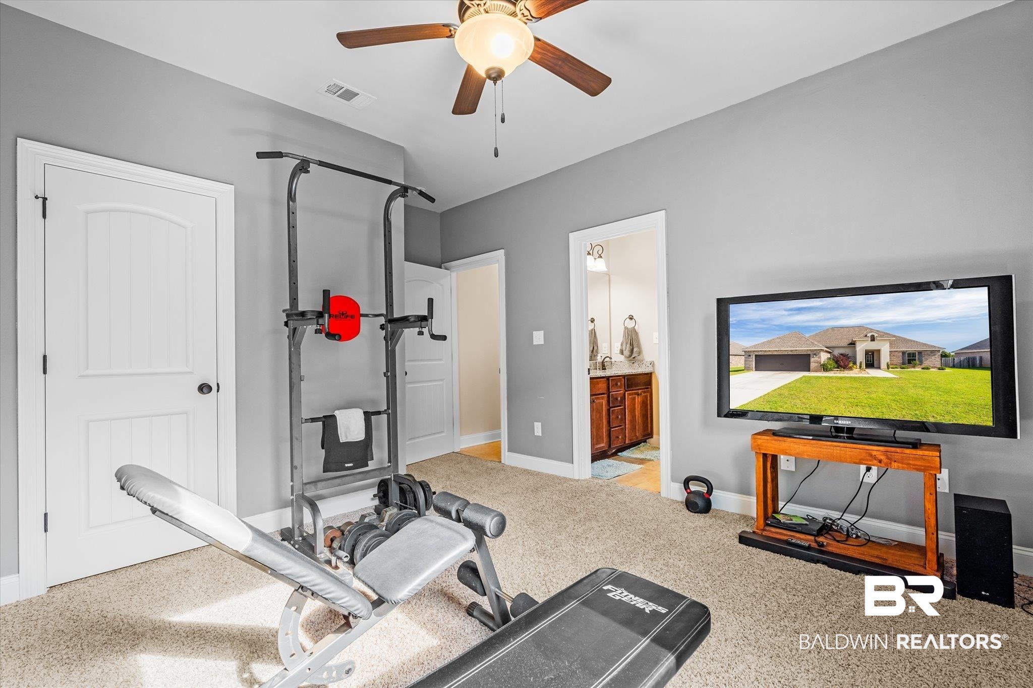 9912 Dunleith Loop Daphne, AL 36526 - Photo 14 of 23 Workout room featuring light colored carpet and ceiling fan