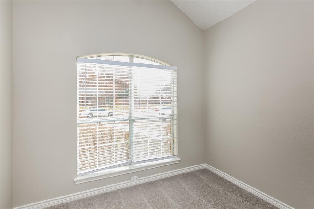 8209 Quail Glenn Court Rowlett, TX 75089 - Photo 12 of 16 a view of an empty room with a window