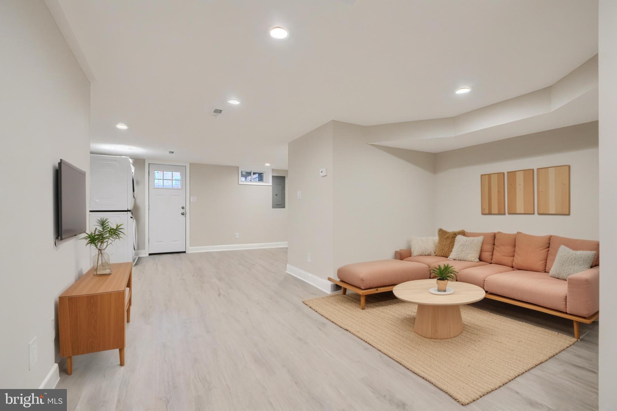 621 Ponca Street Baltimore, MD 21224 - Photo 14 of 38 a living room with furniture and a couch