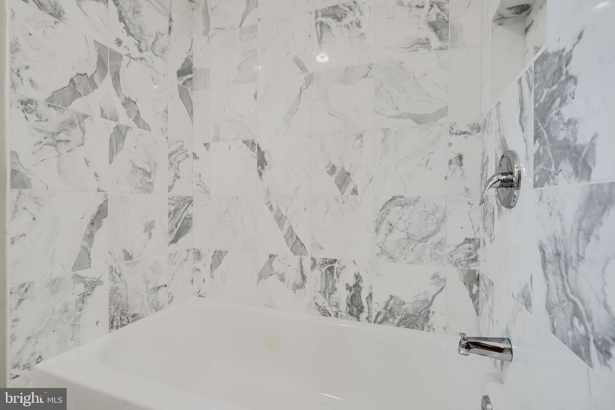 621 Ponca Street Baltimore, MD 21224 - Photo 26 of 38 a bathroom with shower