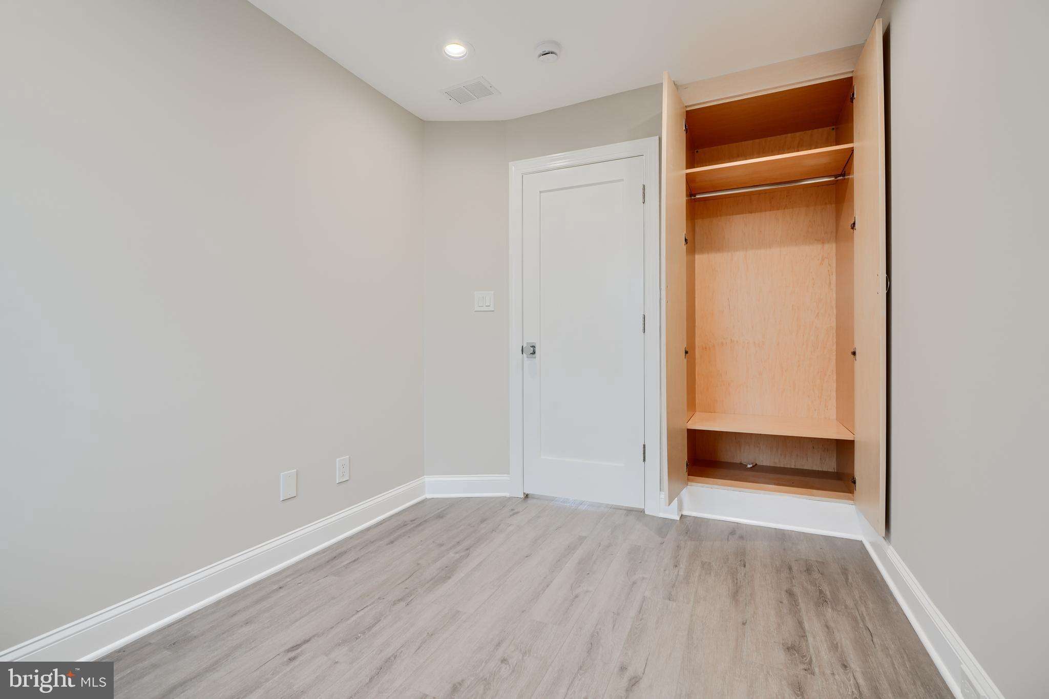 621 Ponca Street Baltimore, MD 21224 - Photo 31 of 38 a view of an empty room and wooden floor