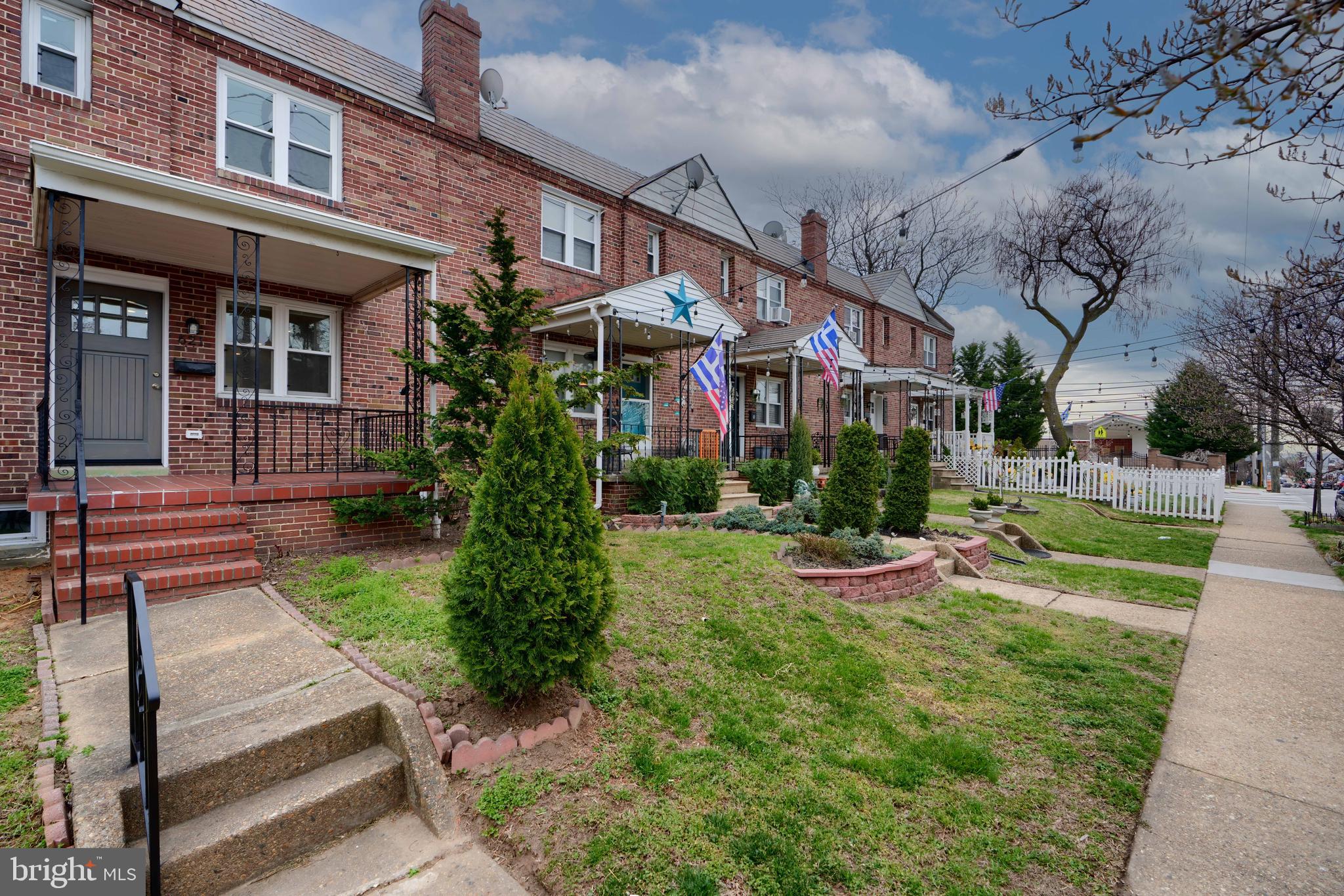 621 Ponca Street Baltimore, MD 21224 - Photo 33 of 38 a view of house with a yard and garden