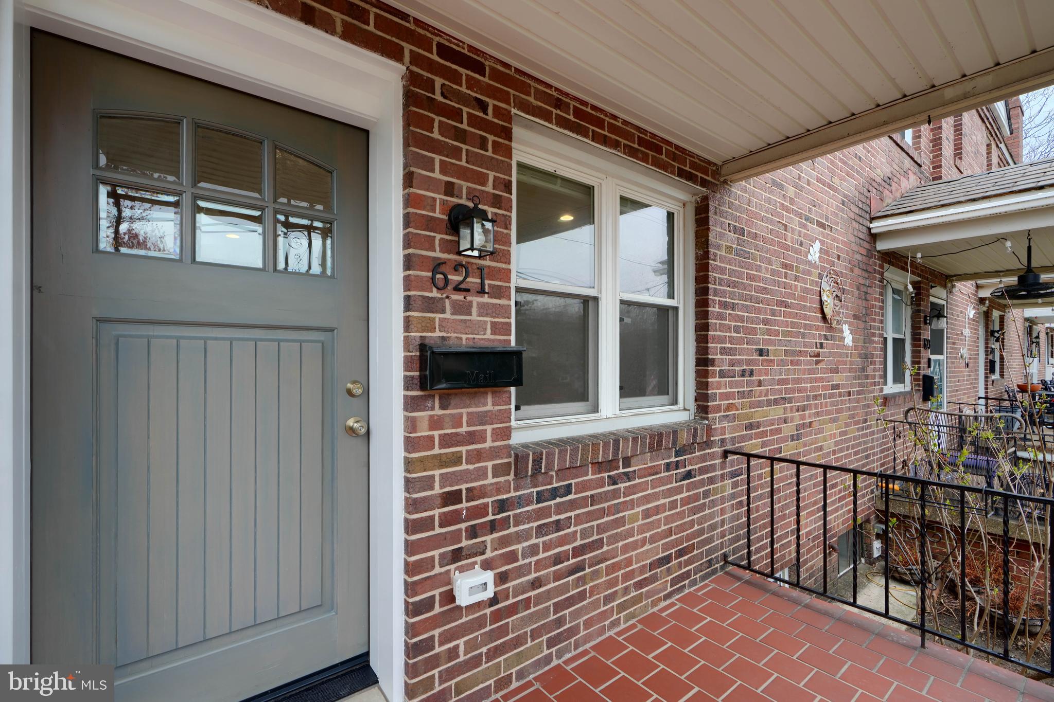 621 Ponca Street Baltimore, MD 21224 - Photo 34 of 38 a view of a brick house with many windows