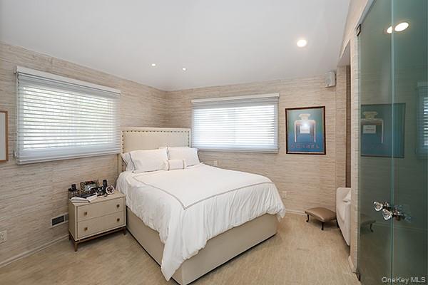 32 Randy Lane Plainview, NY 11803 - Photo 14 of 26 a bedroom with a bed and a window