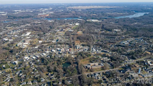 an aerial view of a city with lots of residential buildings