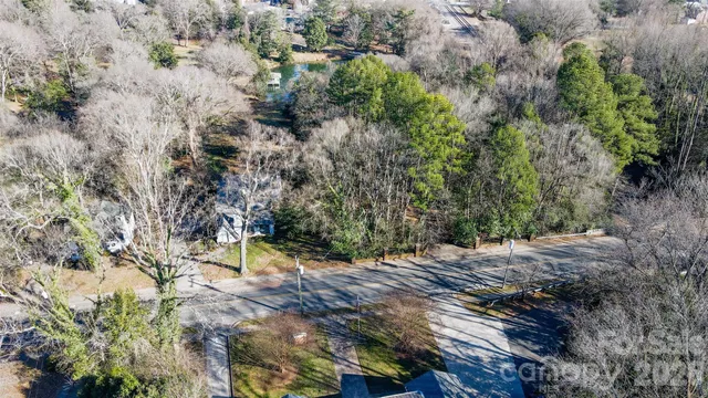 a view of a street with cars