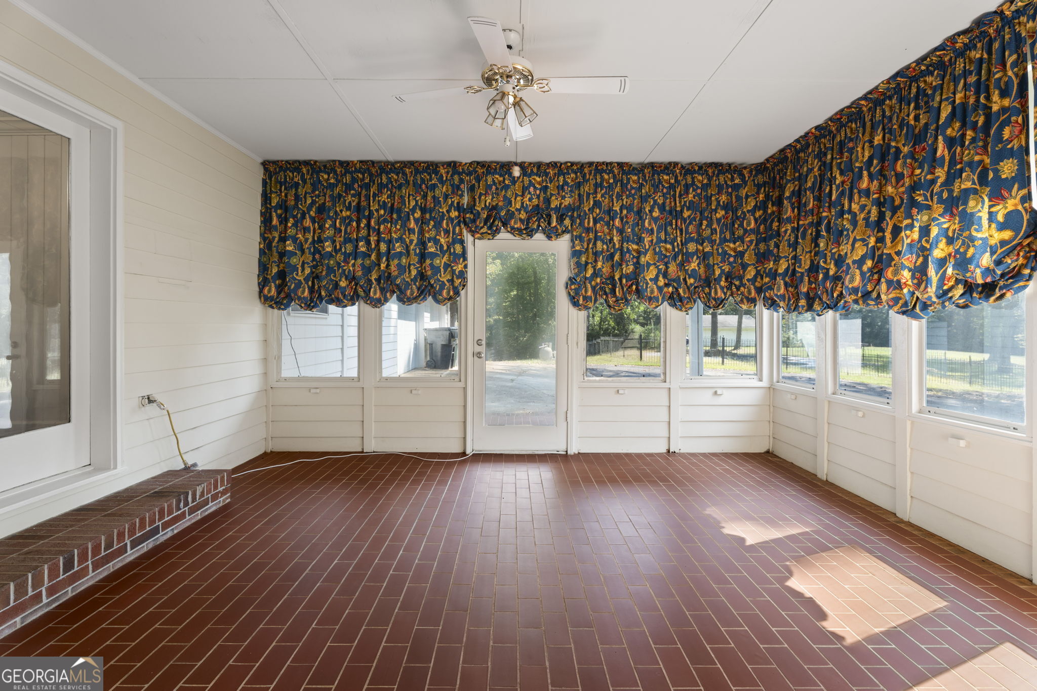 1080 Conyers Road McDonough, GA 30252 - Photo 13 of 55 wooden floor in an empty room with a window