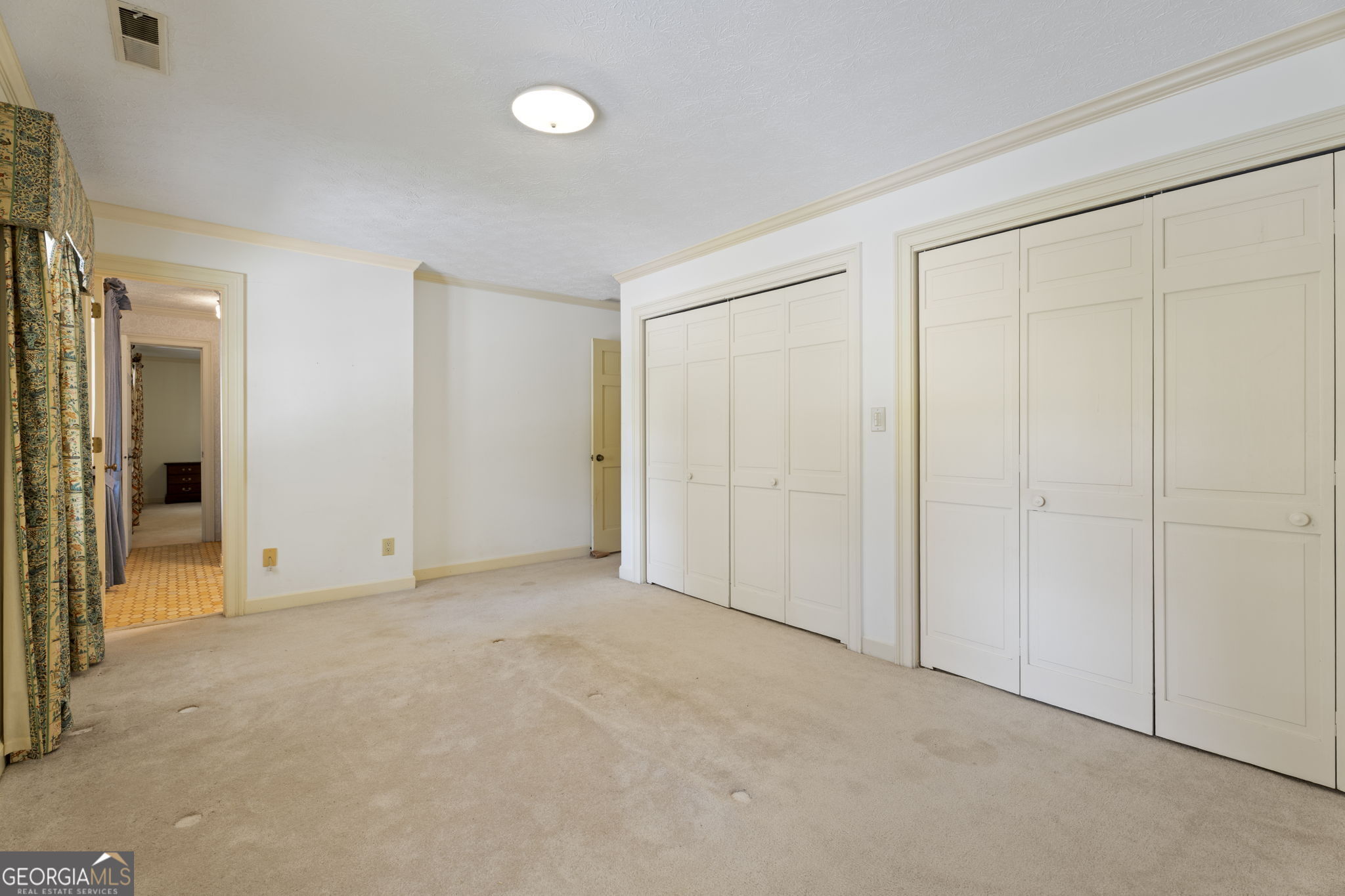 1080 Conyers Road McDonough, GA 30252 - Photo 30 of 55 an empty room with closet area
