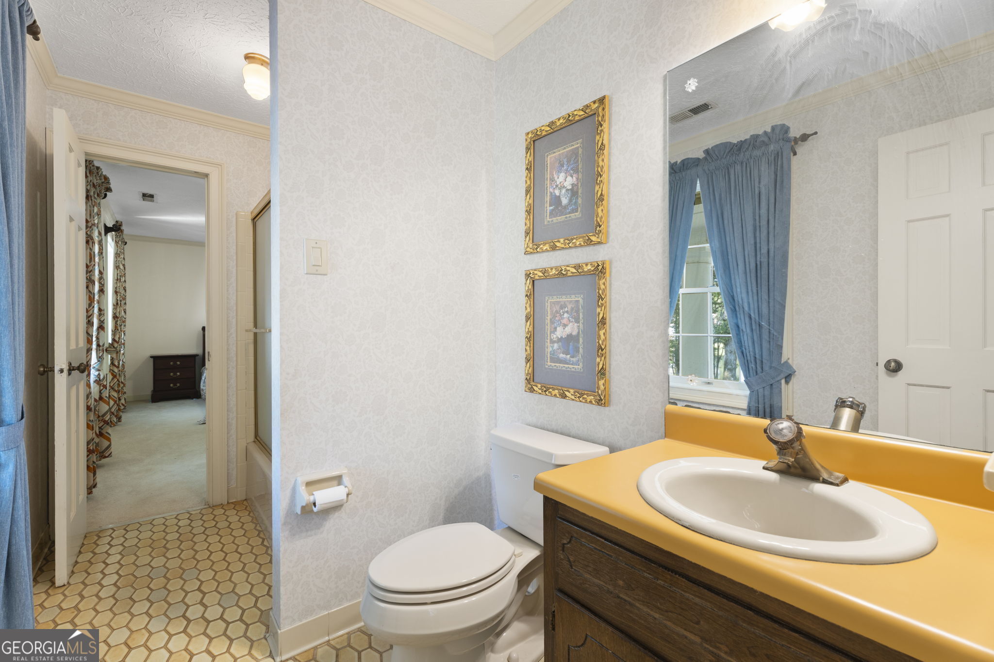 1080 Conyers Road McDonough, GA 30252 - Photo 31 of 55 a bathroom with a sink toilet and shower