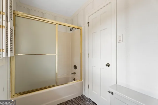a view of a livingroom with furniture and a fireplace