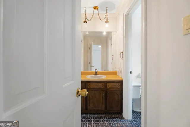 a very nice looking room with a large mirror and furniture