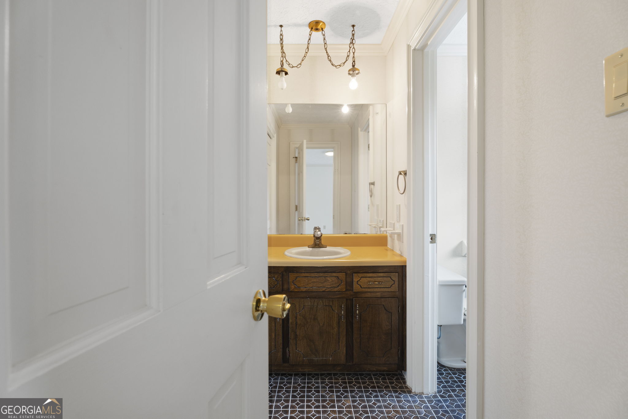 1080 Conyers Road McDonough, GA 30252 - Photo 39 of 55 a bathroom with a sink and a mirror