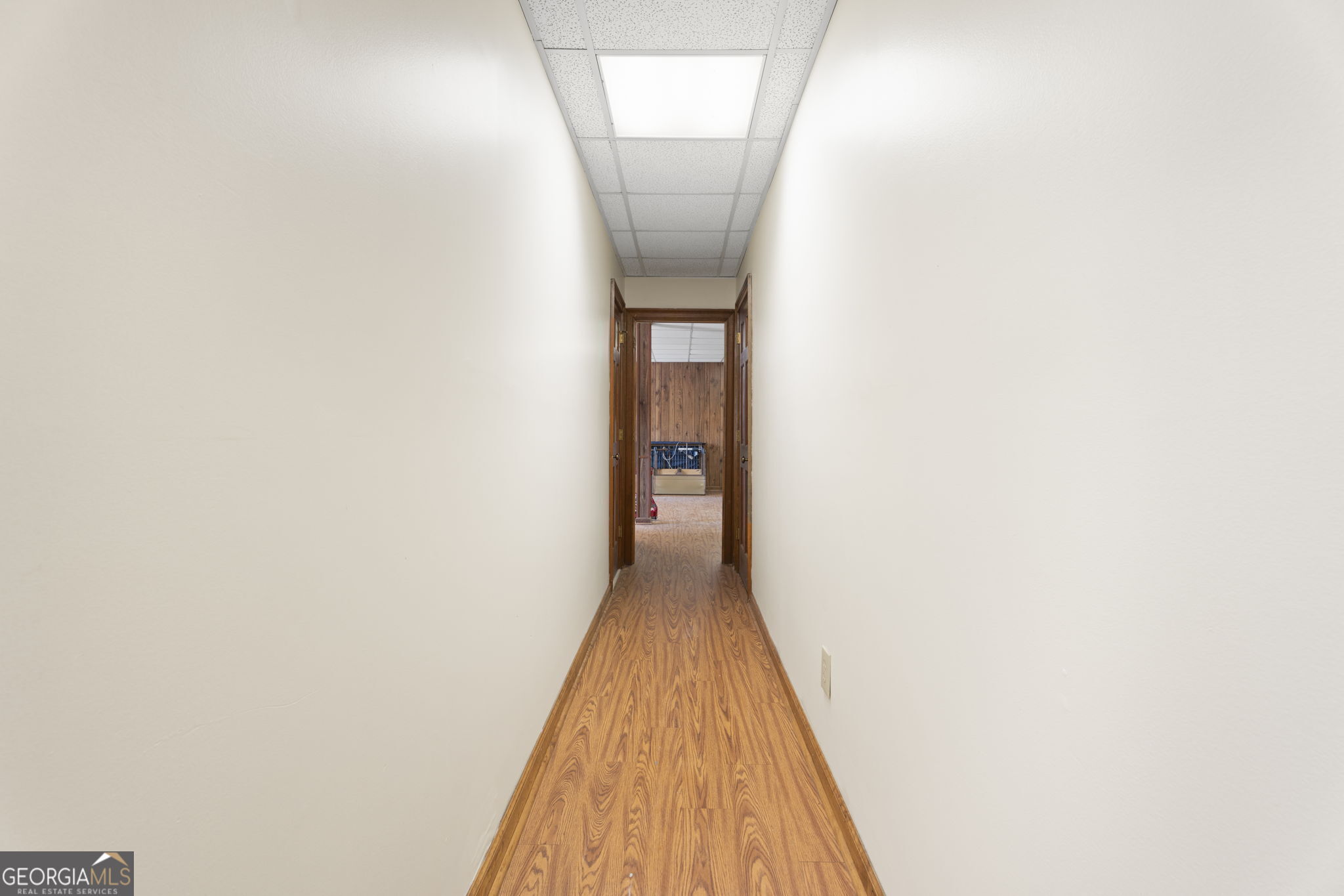 1080 Conyers Road McDonough, GA 30252 - Photo 43 of 55 a view of a hallway with wooden floor