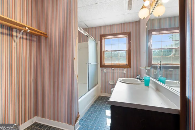 a view of a swimming pool with a patio