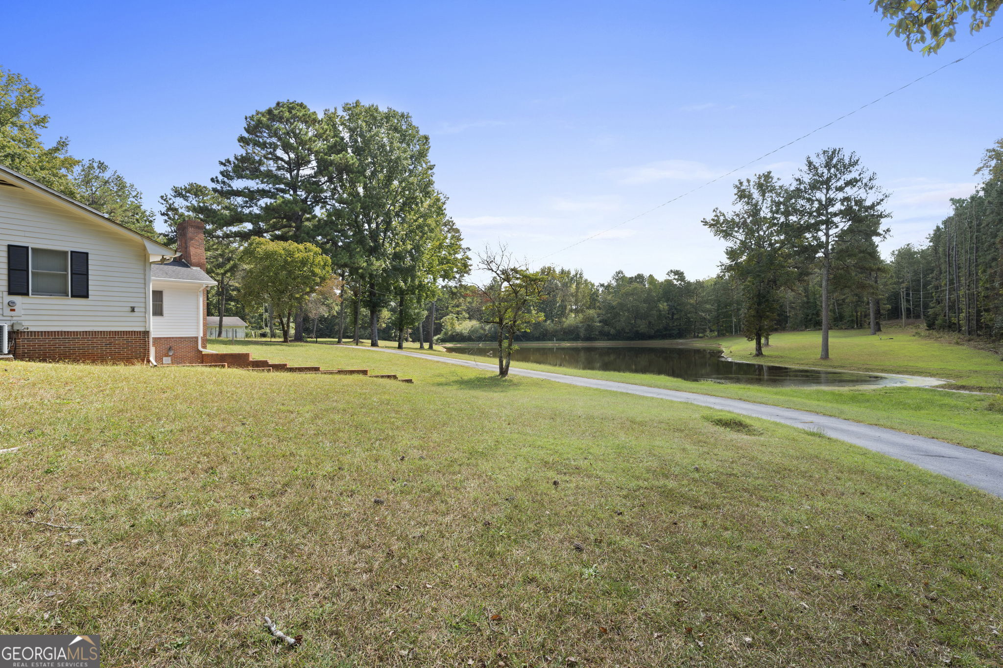 1080 Conyers Road McDonough, GA 30252 - Photo 52 of 55 a view of outdoor space with playground and green space