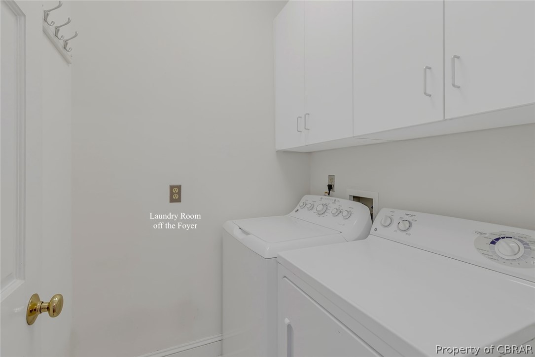 5818 Rivers Landing Terrace, Unit 5818 White Stone, VA 22578 - Photo 24 of 50 Washroom featuring washing machine and dryer, cabinets, and hookup for a washing machine