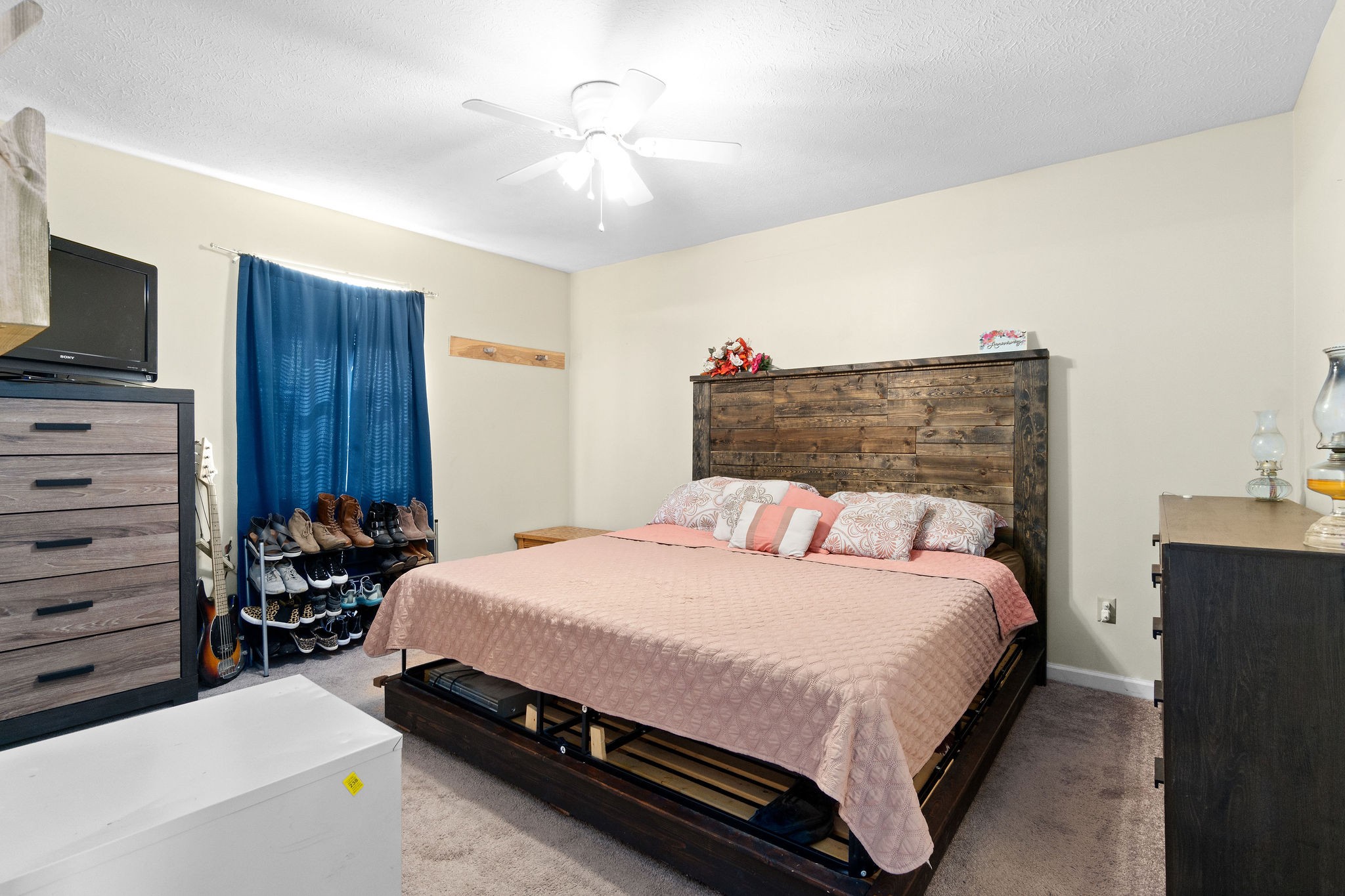 916 Hugh Hunter Road Oak Grove, KY 42262 - Photo 13 of 30 a bedroom with a bed and a television