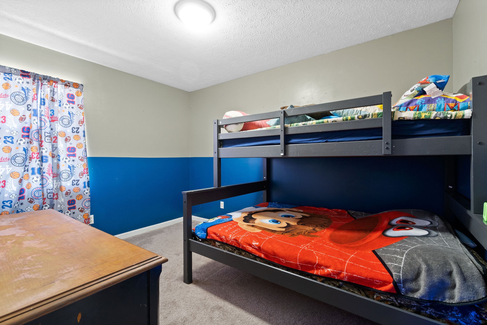 916 Hugh Hunter Road Oak Grove, KY 42262 - Photo 20 of 30 a bedroom with a bed and a dresser