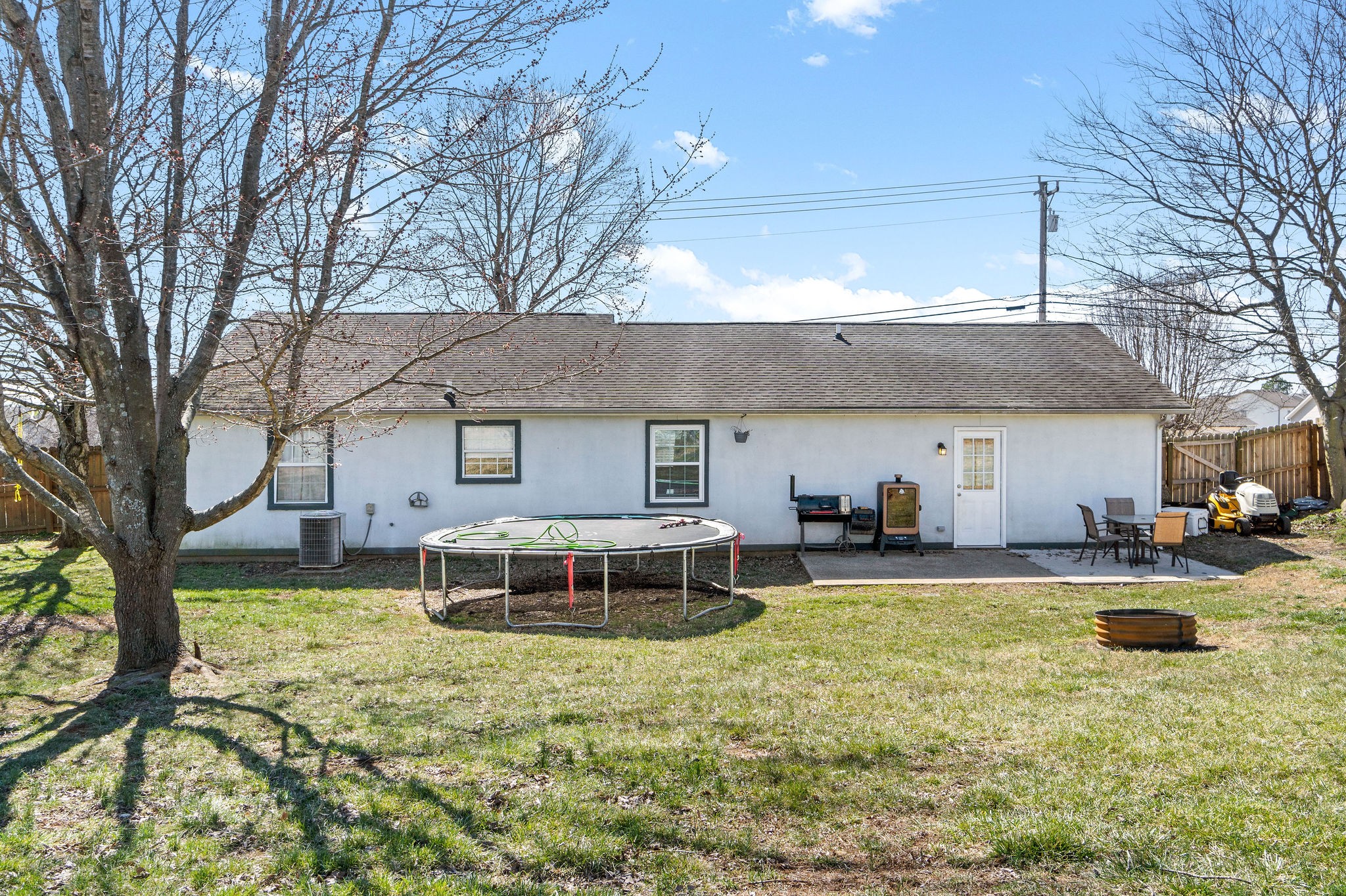 916 Hugh Hunter Road Oak Grove, KY 42262 - Photo 24 of 30 a view of a house with pool and chairs