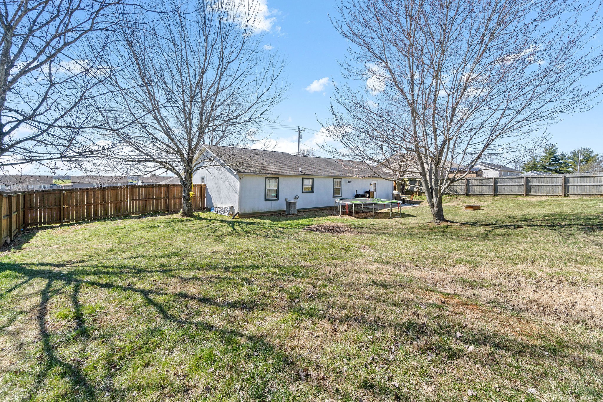 916 Hugh Hunter Road Oak Grove, KY 42262 - Photo 27 of 30 a swimming pool with the trees in the background