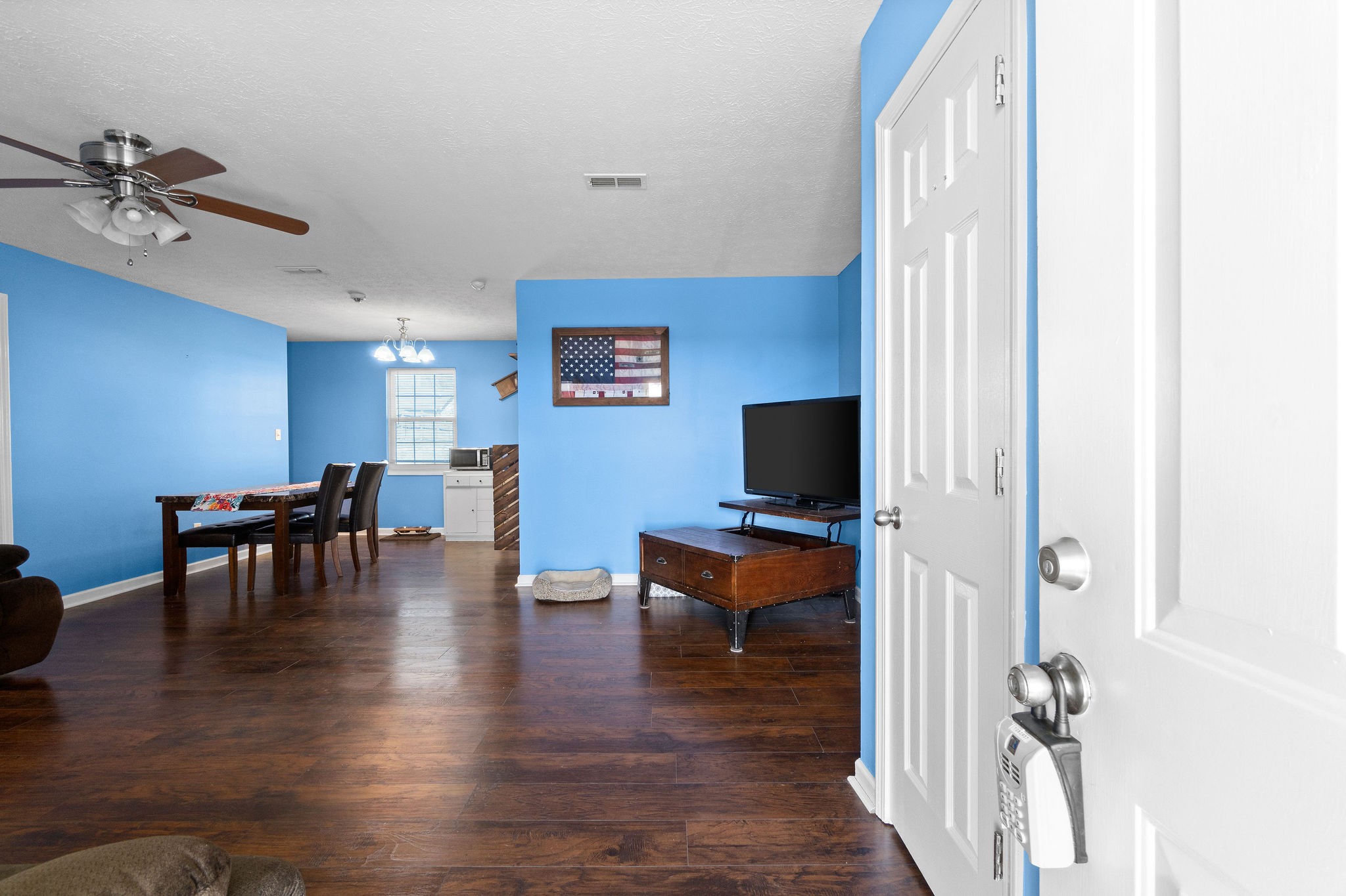 916 Hugh Hunter Road Oak Grove, KY 42262 - Photo 3 of 30 a view of a livingroom with furniture and a flat screen tv