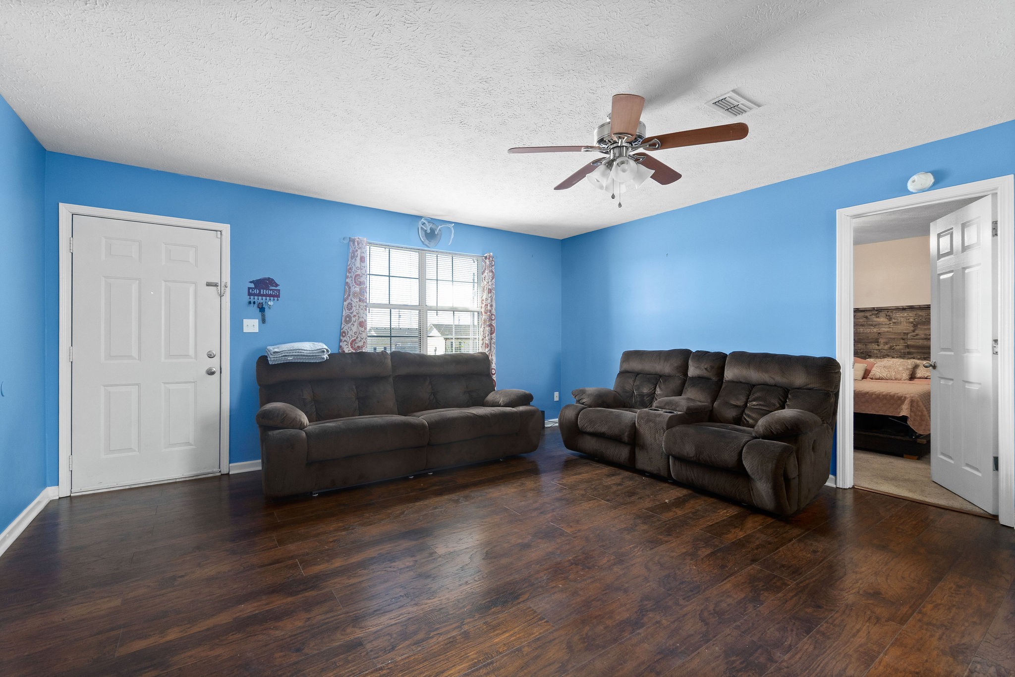 916 Hugh Hunter Road Oak Grove, KY 42262 - Photo 7 of 30 a living room with furniture and a window
